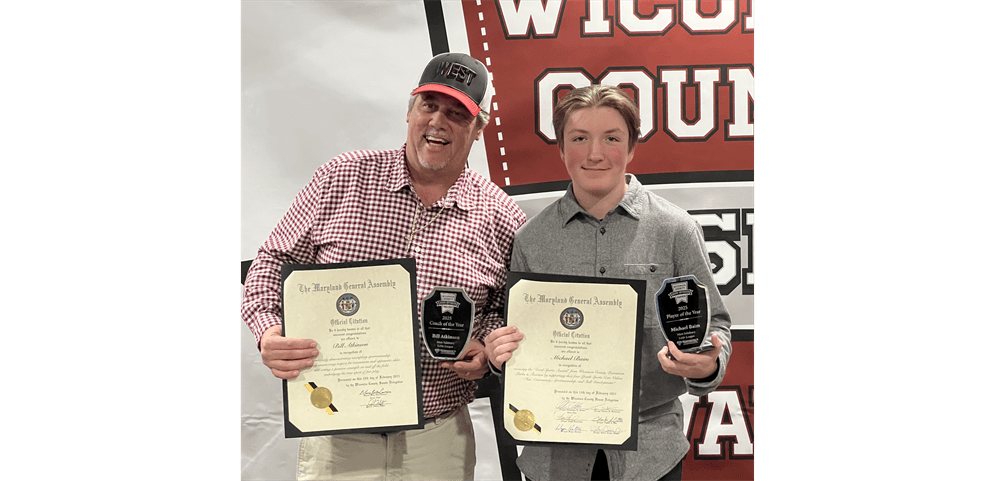 Player of the Year Michael Baim and Coach of the Year Bill Atkinson
